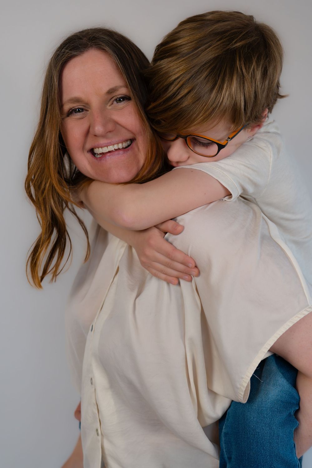 A hug for mummy from her eldest child.