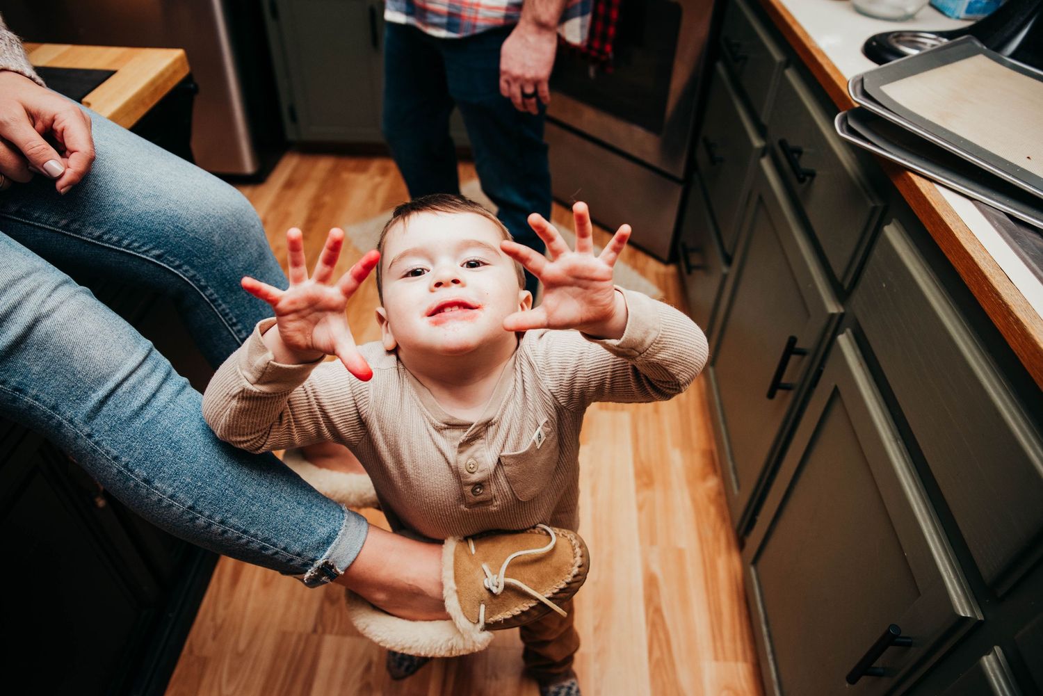 Family fun during Christmas cooking photo session in New Gloucester Maine.