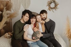 A collection of intimate family portraits in warm neutral tones showing tender moments between parents and baby.