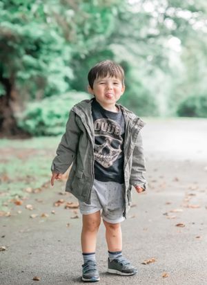 Little boy sticking his tongue out