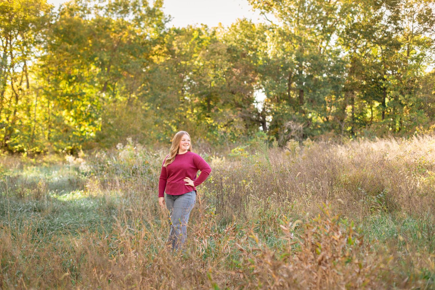 Ag student chose a gorgeous sunset field for her senior pictures.