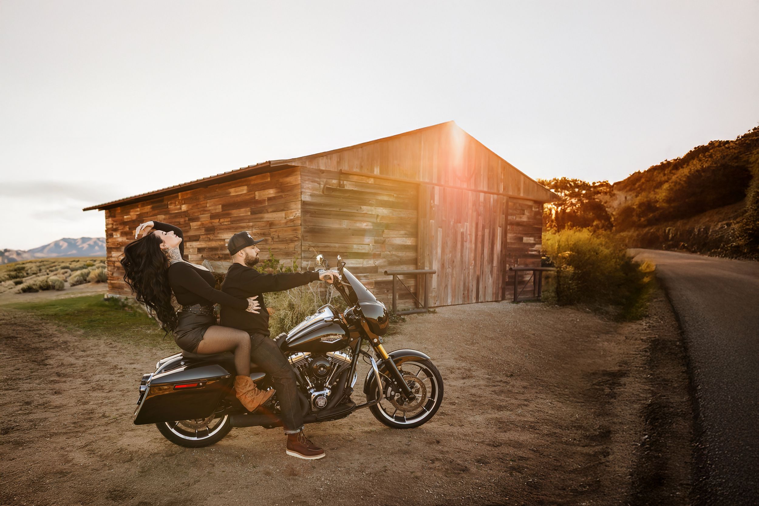 motorcycle couple portrait at sunset in the High Desert near Oak Hills California