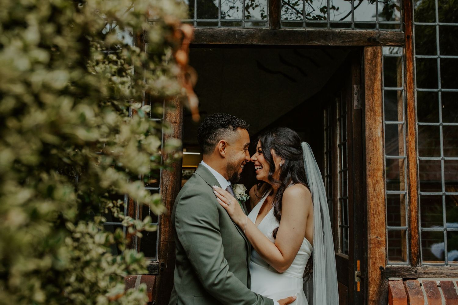 “Bride and groom at their wedding at Ramster Hall, Chiddingfold, Surrey
