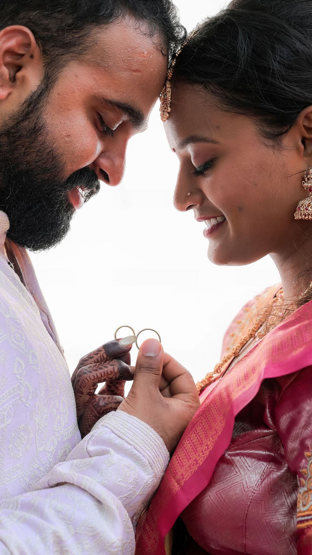 Couple sharing an intimate moment during their wedding photography session