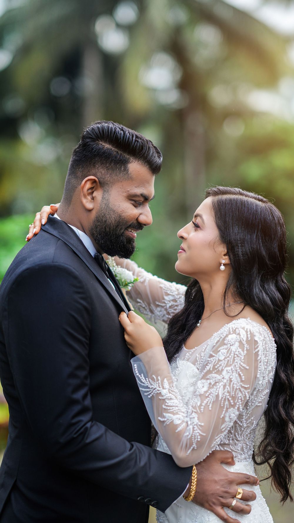 Bride and groom embracing during an outdoor wedding portrait session