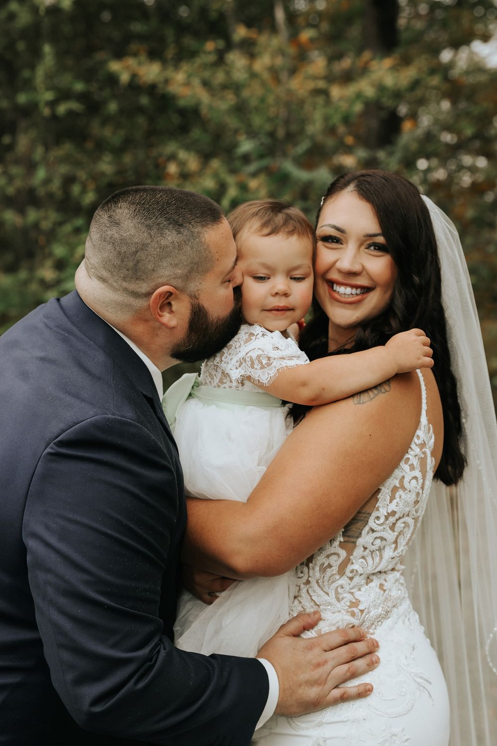Intimate wedding portrait sequence showing tender moments between newlyweds in a forest setting.