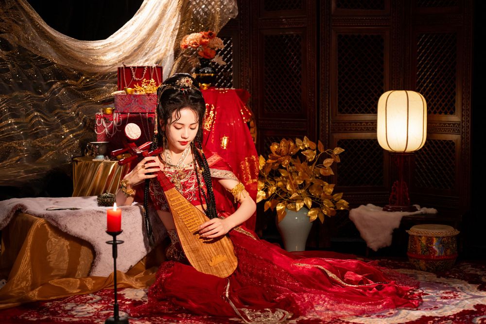 Dynamic photo of a beautiful assassin in red Western Regions Hanfu dancing among gold, silver, and flowers. Studio shot by Imagine Image Stu
