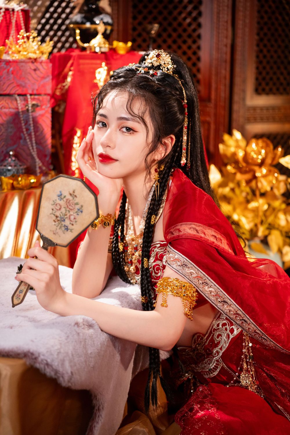 Dynamic photo of a beautiful assassin in red Western Regions Hanfu dancing among gold, silver, and flowers. Studio shot by Imagine Image Stu