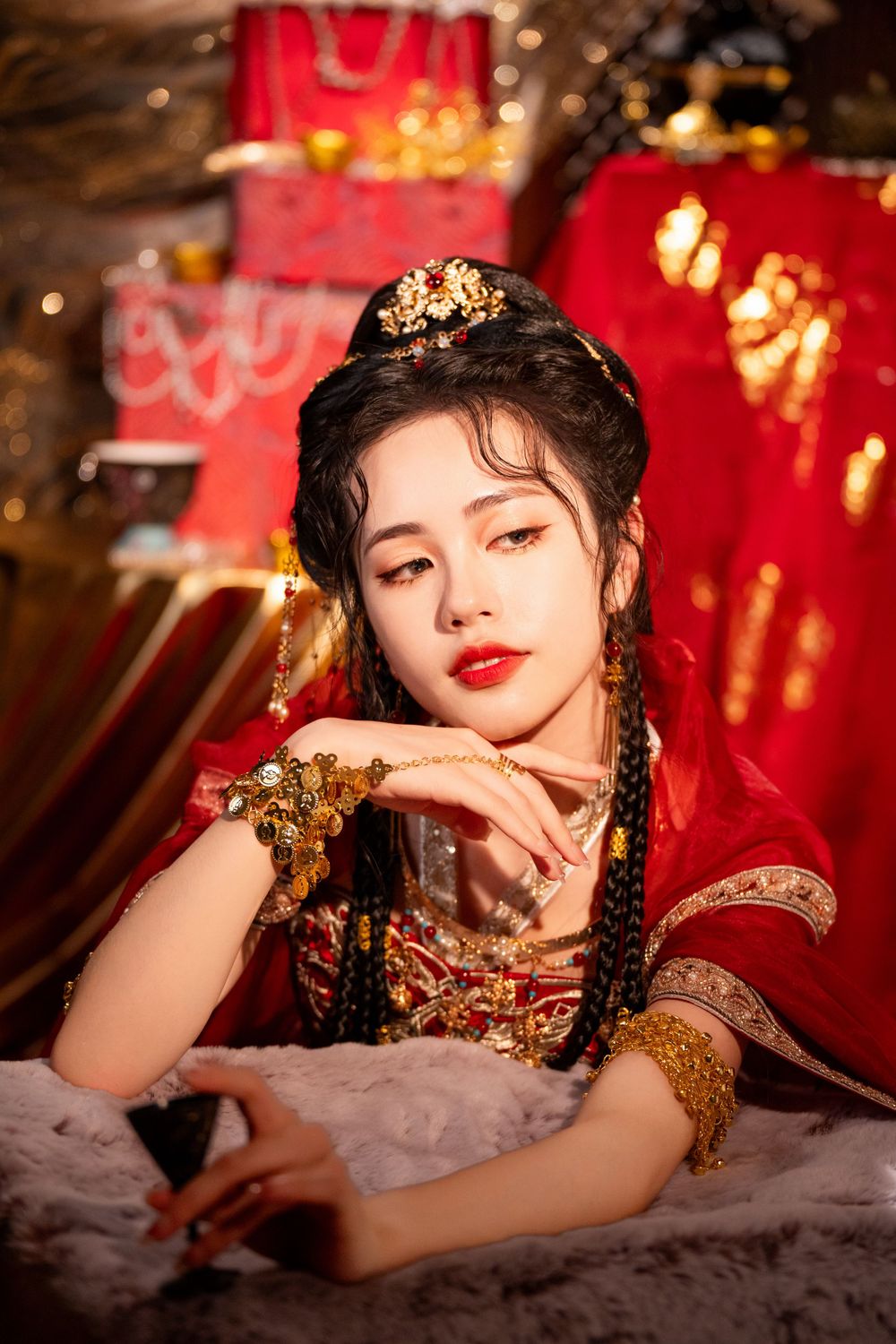 Dynamic photo of a beautiful assassin in red Western Regions Hanfu dancing among gold, silver, and flowers. Studio shot by Imagine Image Stu