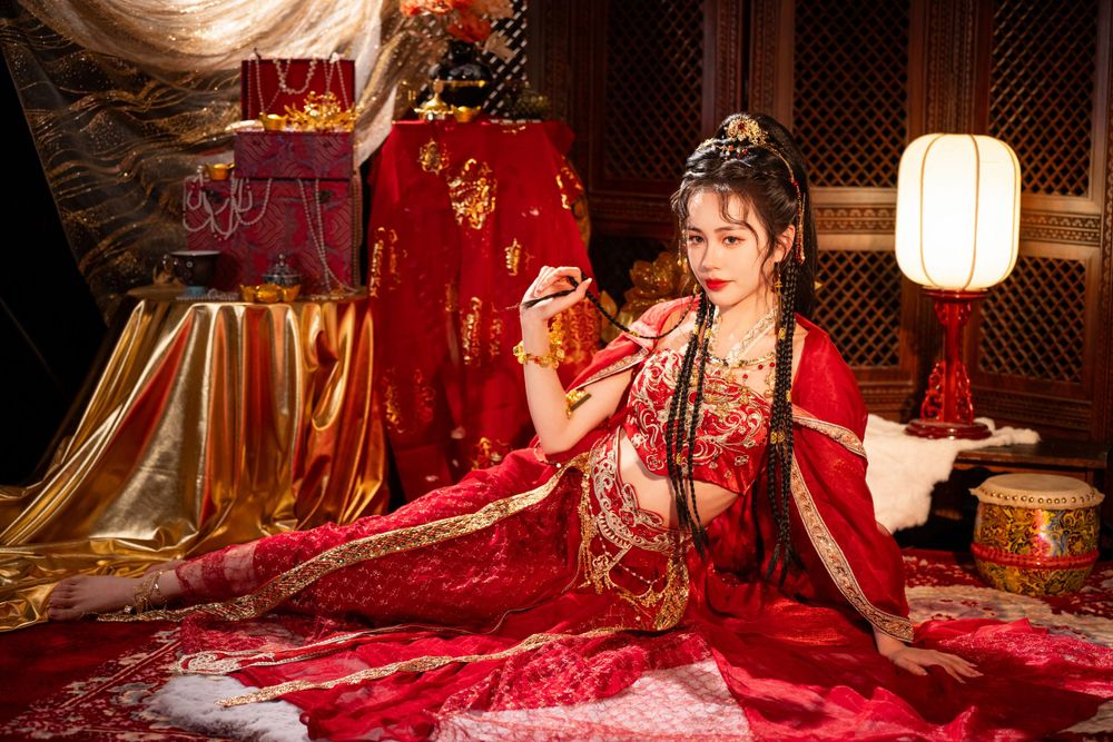 Dynamic photo of a beautiful assassin in red Western Regions Hanfu dancing among gold, silver, and flowers. Studio shot by Imagine Image Stu