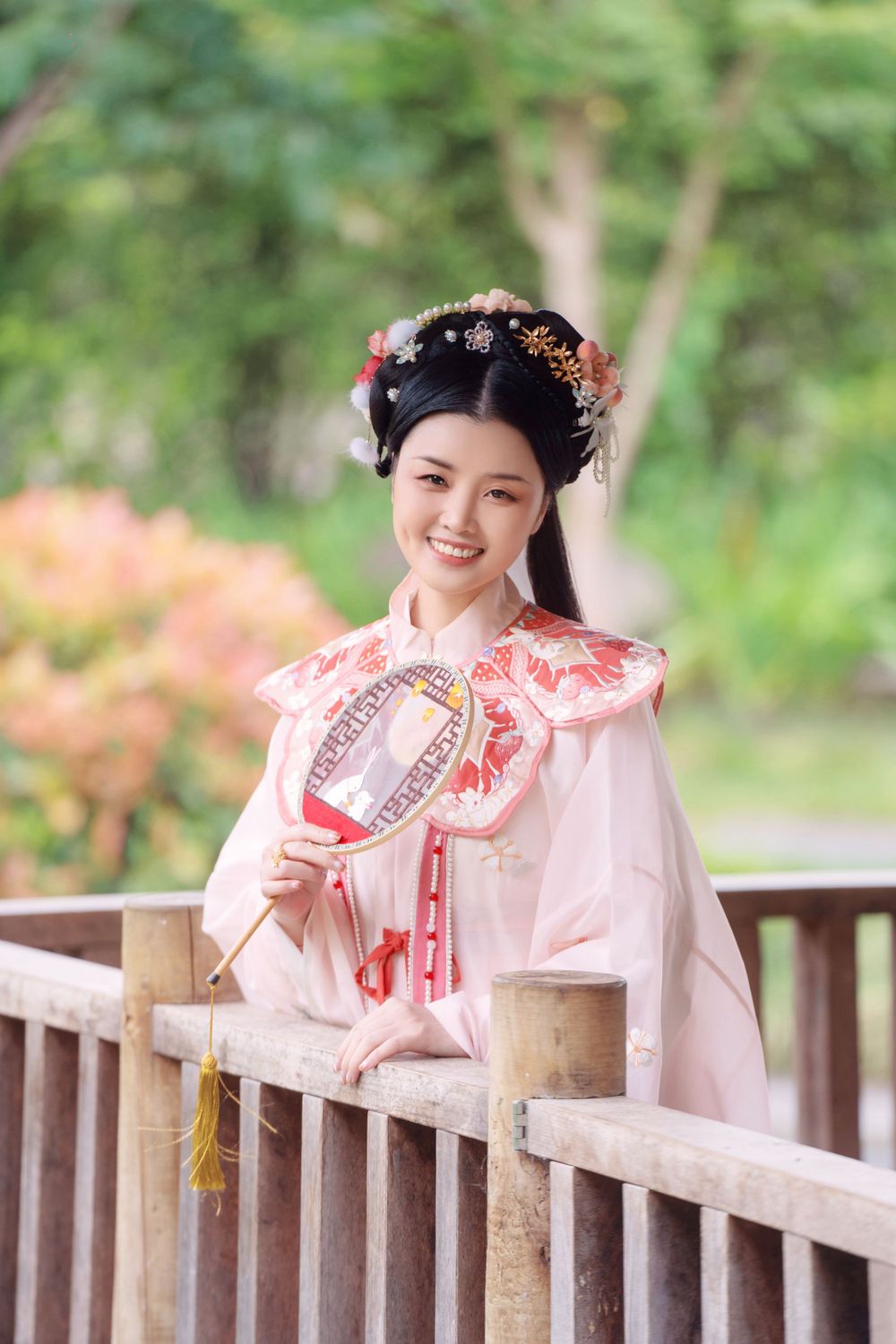 Adorable outdoor Hanfu photography featuring a strawberry bunny theme at Western Springs, captured by Imagine Image Studio.