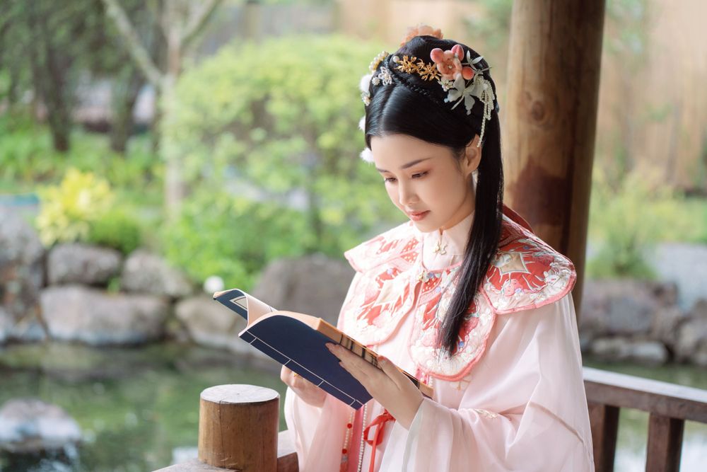 Adorable outdoor Hanfu photography featuring a strawberry bunny theme at Western Springs, captured by Imagine Image Studio.