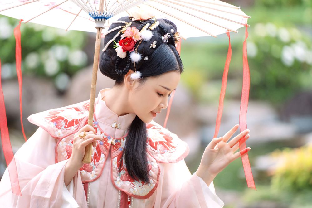 Adorable outdoor Hanfu photography featuring a strawberry bunny theme at Western Springs, captured by Imagine Image Studio.
