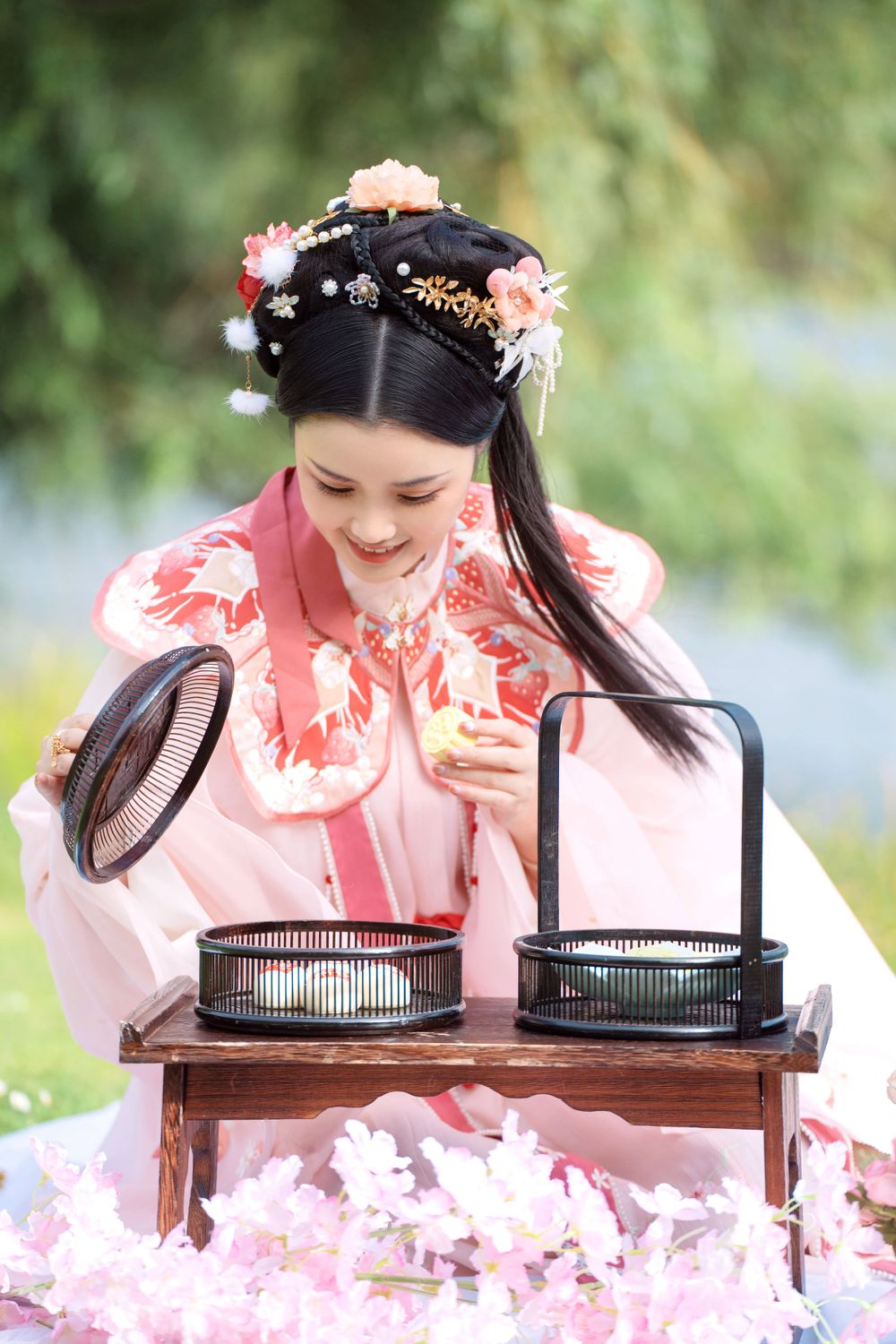Natural and sweet solo photography in a strawberry rabbit Hanfu at Western Springs, by Imagine Image Studio Auckland.