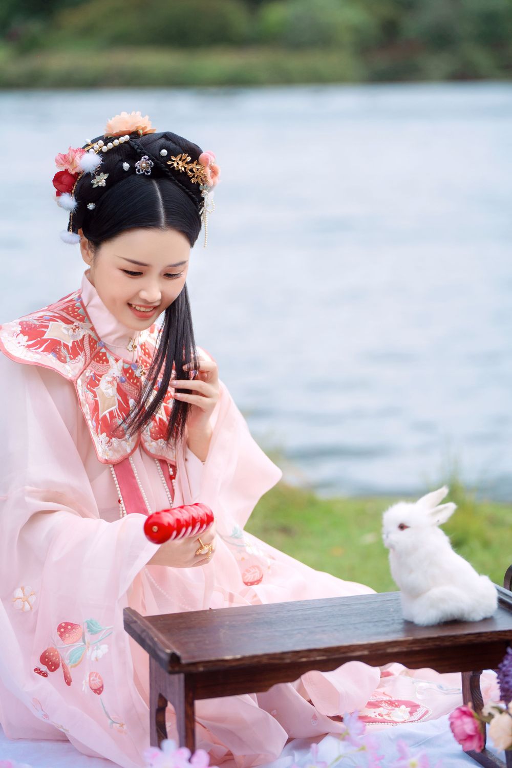 Cute strawberry bunny themed Hanfu portrait in the natural outdoors of Western Springs, by Imagine Image Studio.