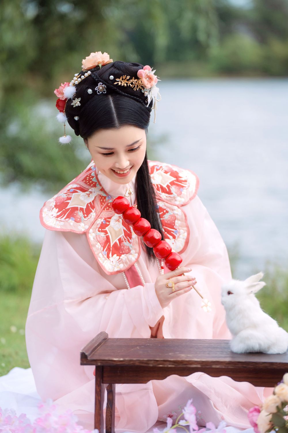 Cute strawberry bunny themed Hanfu portrait in the natural outdoors of Western Springs, by Imagine Image Studio.