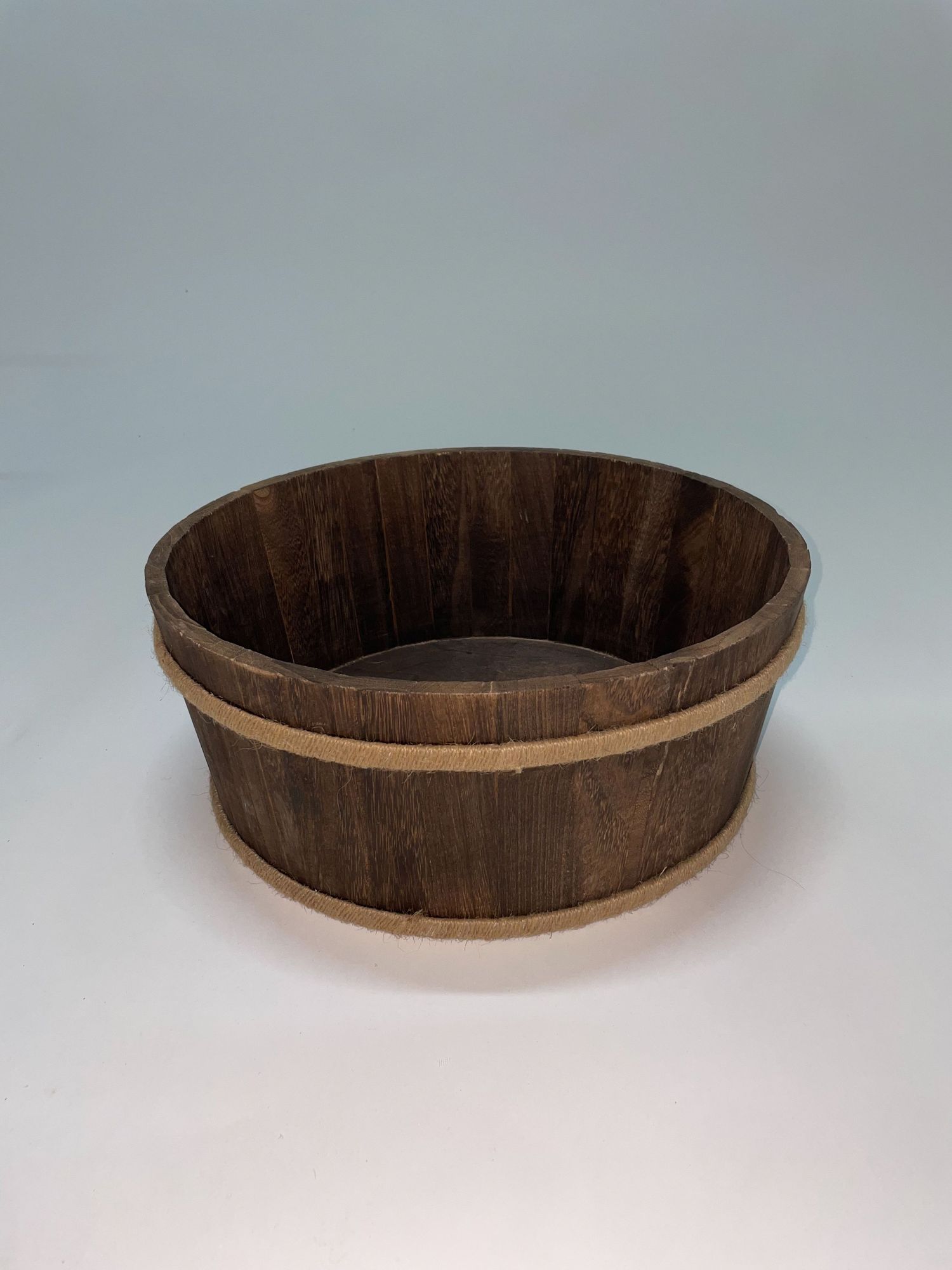 Wooden barrel or basket rim shown from different perspectives against white background.