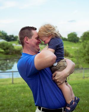 A sequential series of photos depicts a tender moment between parent and child at a scenic outdoor location.