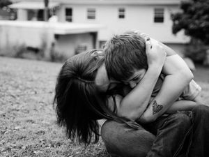 Black and white artistic photo series showing intimate moments of connection and playfulness.