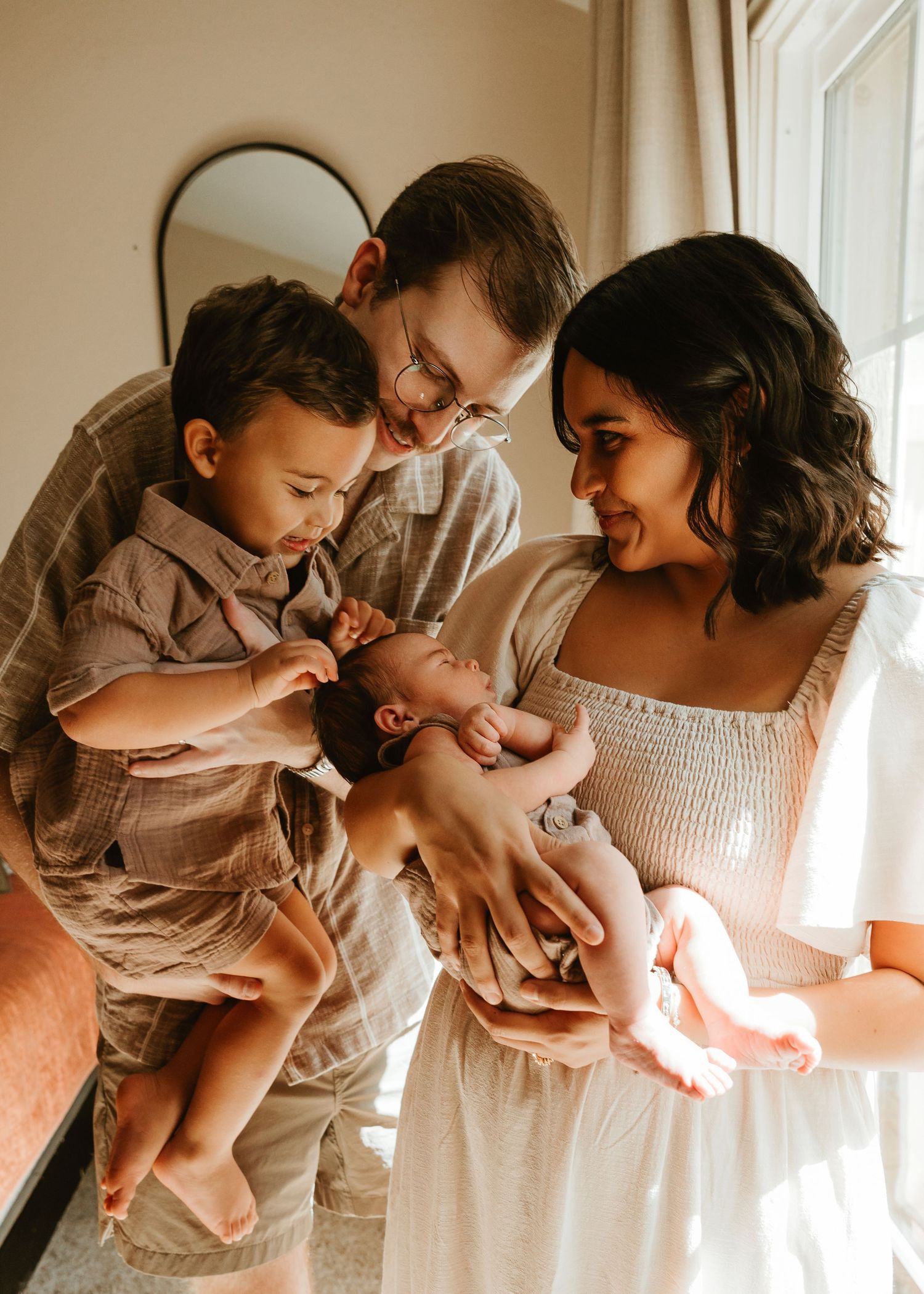In-home newborn lifestyle family session in Houston Texas with natural light