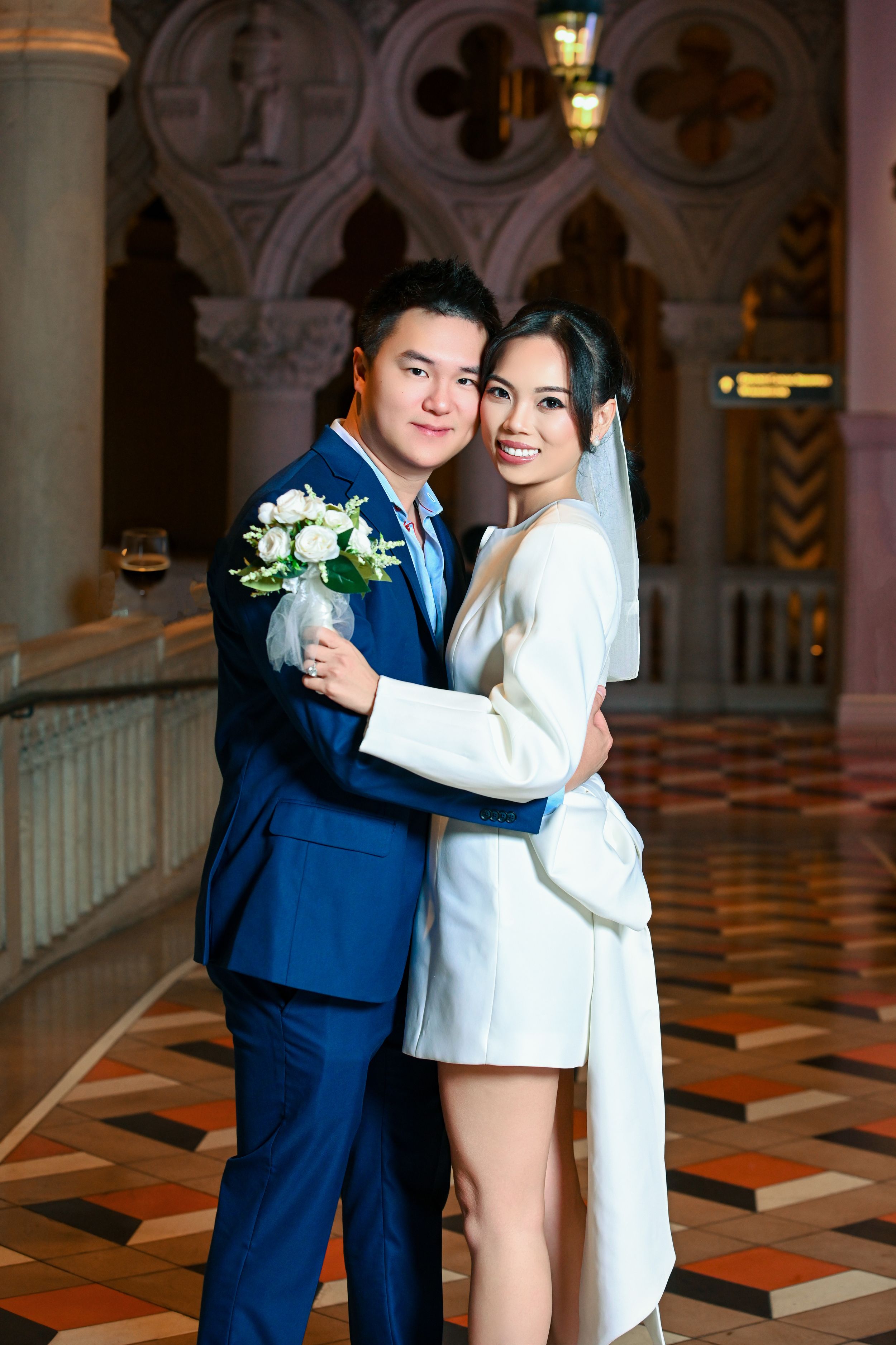 Elegant Couple Portrait in Luxury Wedding Attire at the Venetian las Vegas  by Marley Domeck