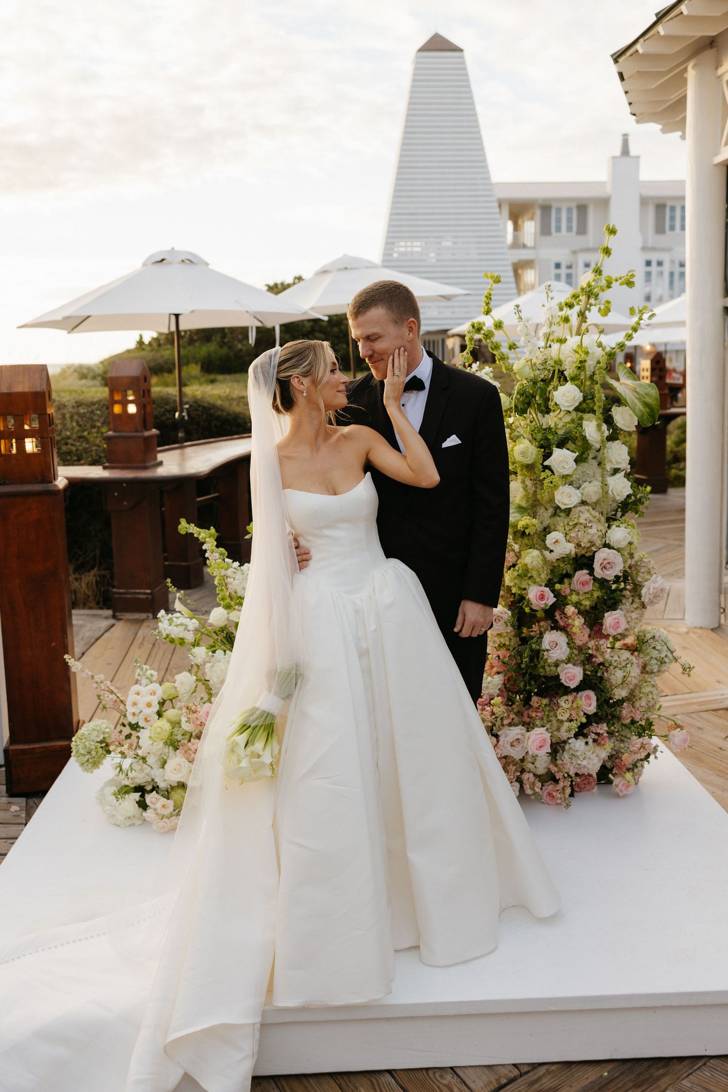 a wedding in Santa Rosa Beach. The couple is going in for a kiss