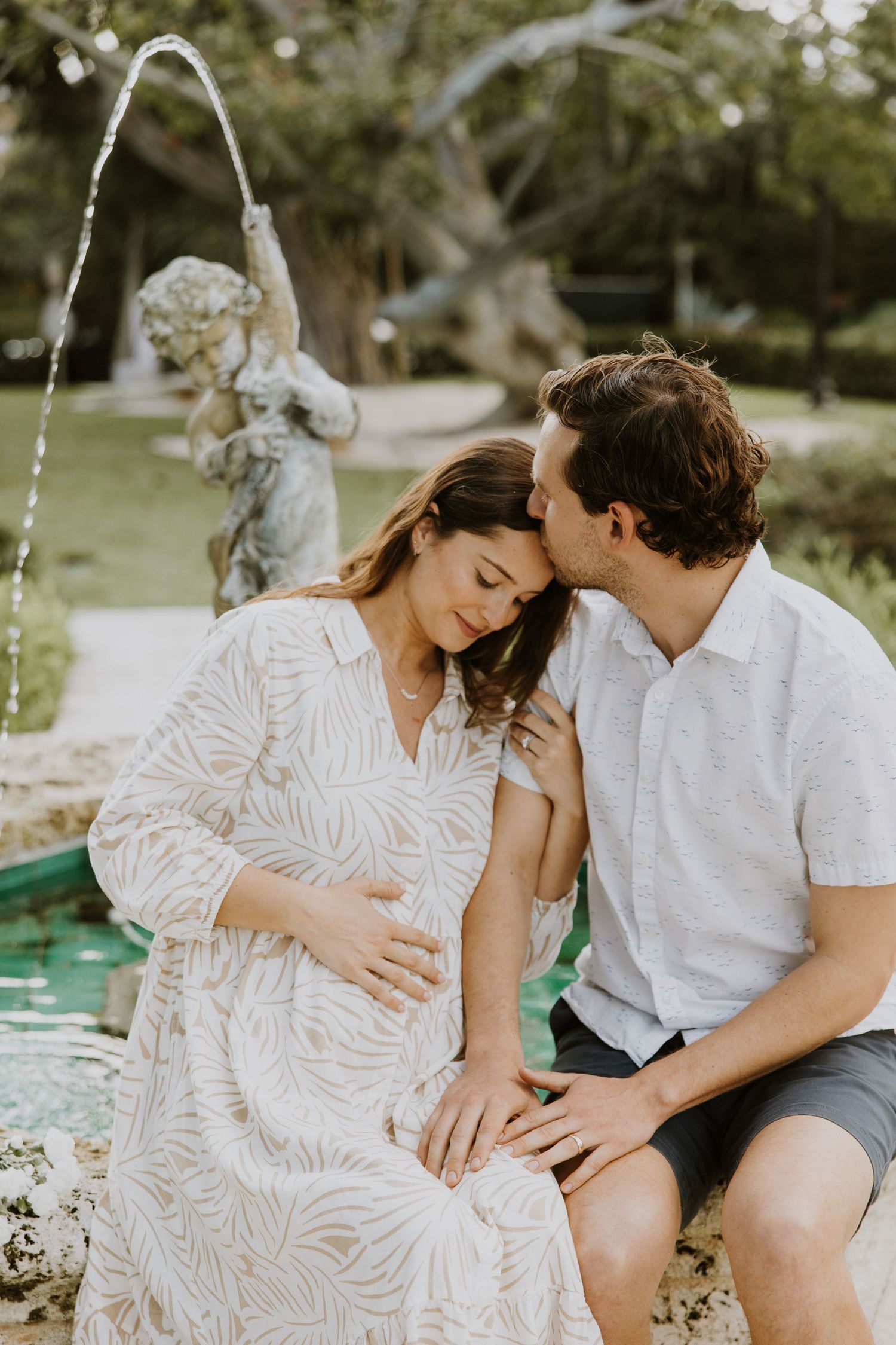 Golden Hour Maternity photos captured by Lindsay McDow Photography in Downtown Palm Beach