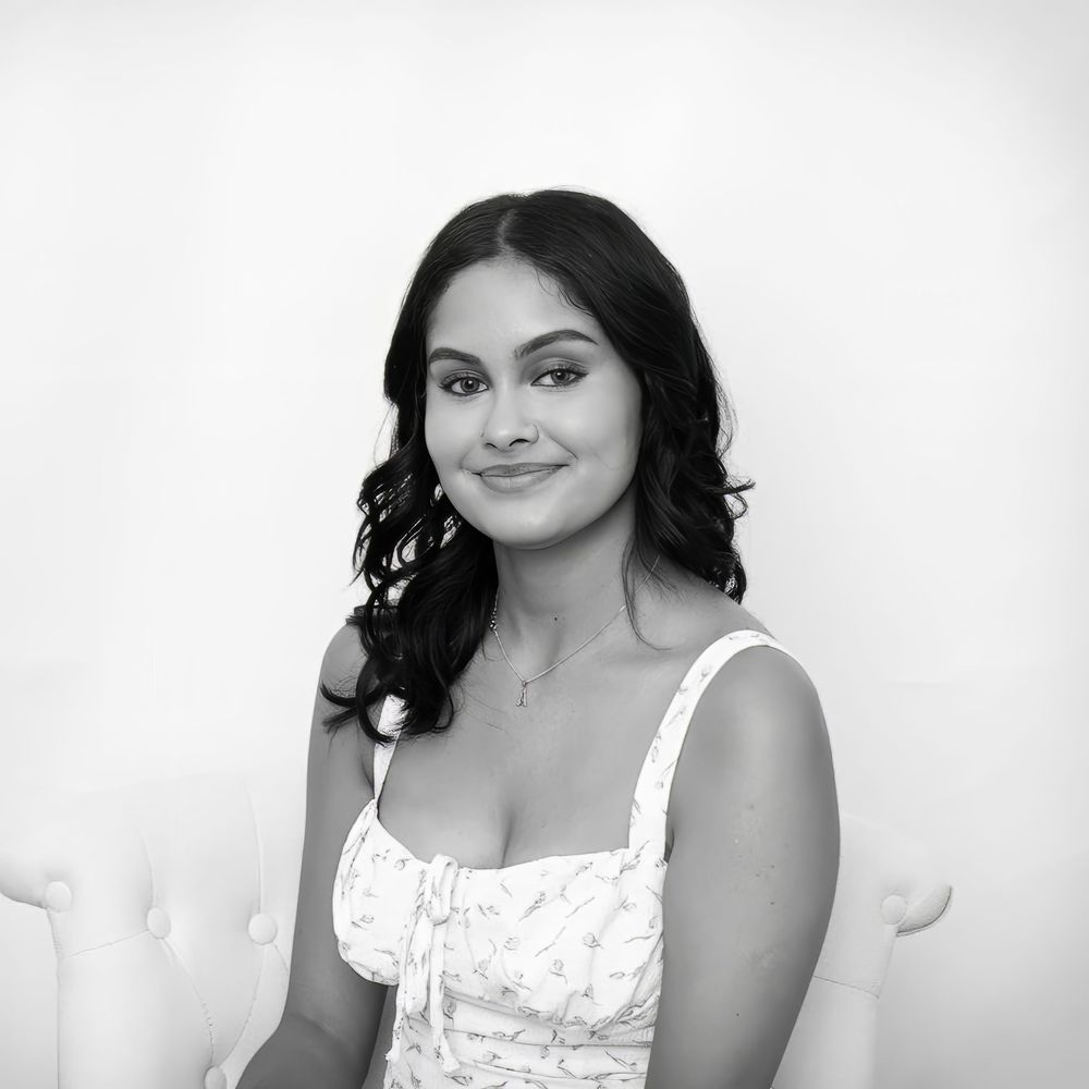 A series of black and white portraits showing someone in a white top against a light background.