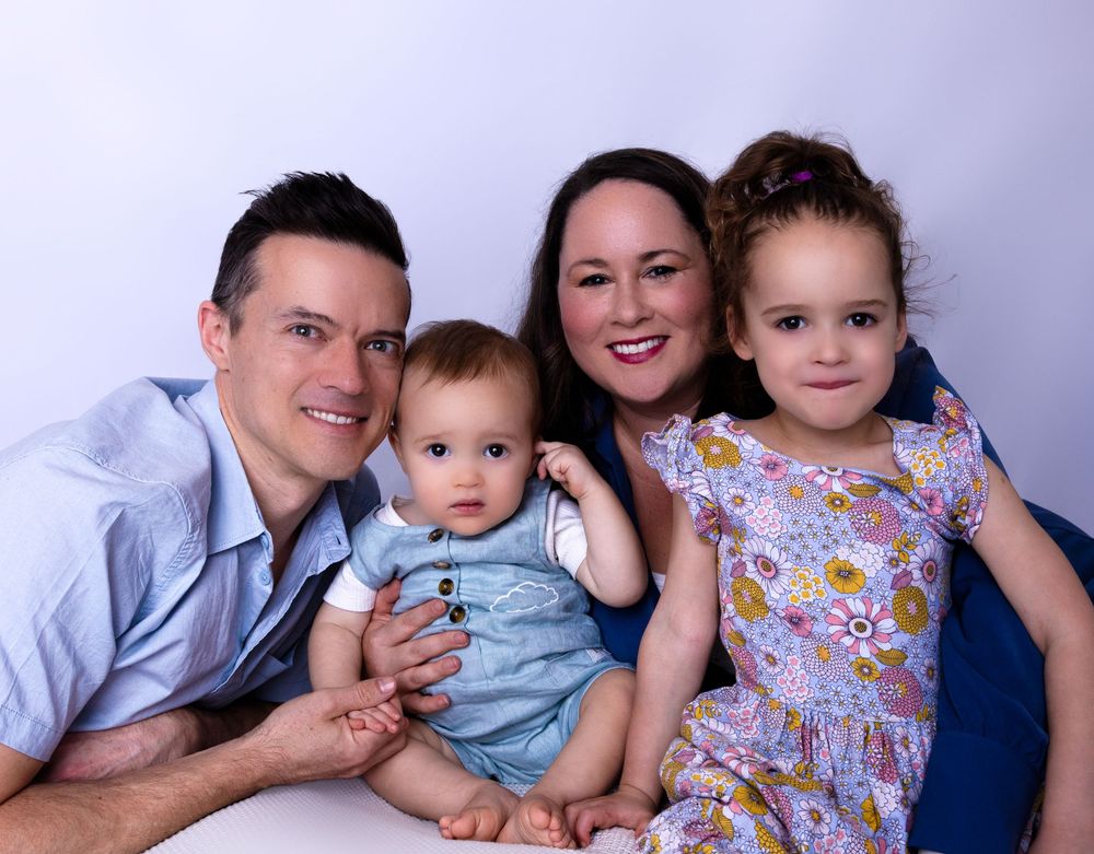 A collage of casual family portraits showing tender moments between parents and children against neutral backgrounds.