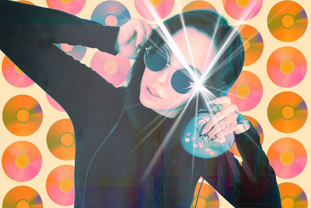 Person in black outfit and sunglasses dances with headphones and disco ball against colorful vinyl record background.