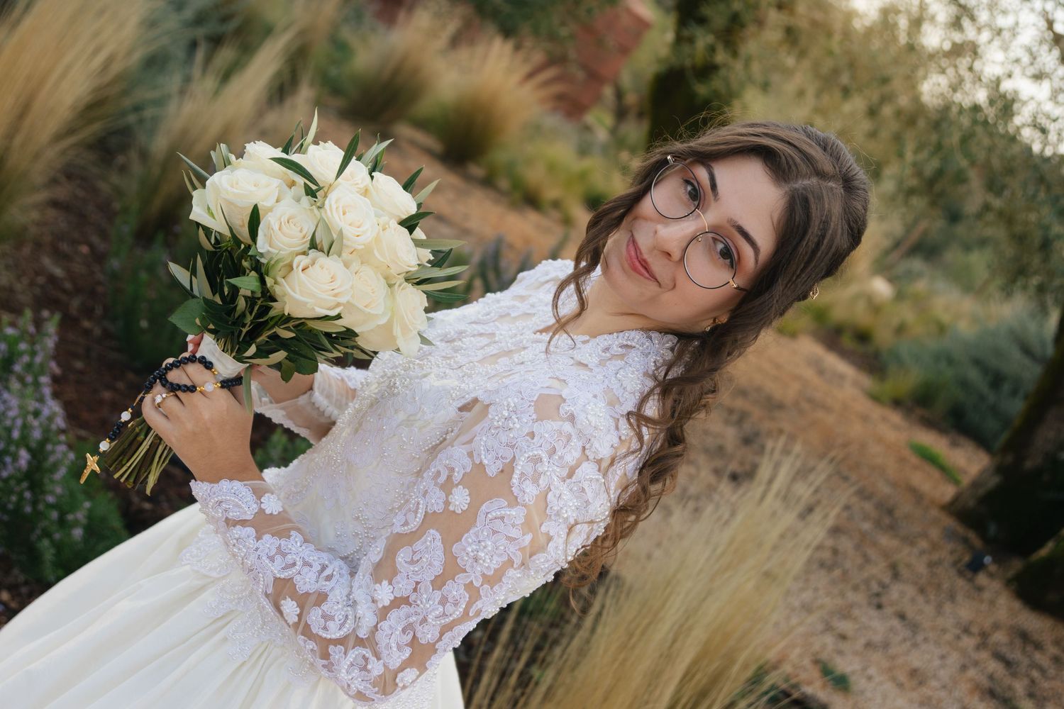 A series of outdoor bridal portraits showing a white lace wedding dress against a natural backdrop.