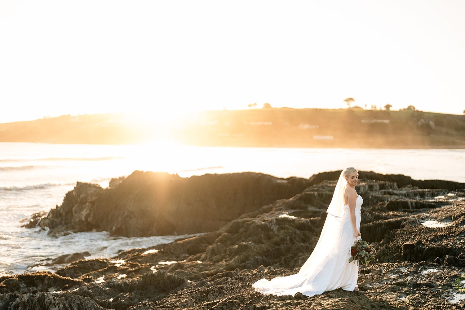 Cork Wedding Photographer captures the bride at the Incyhdoney Hotel and Spa wedding. Wedding Photos by Sarah Kate Photography