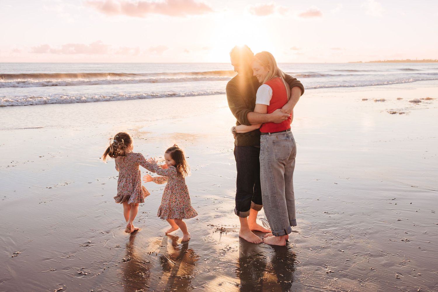 Family getting photos taken at sunset with kids playing in foothills, ideas on what to wear to photography session