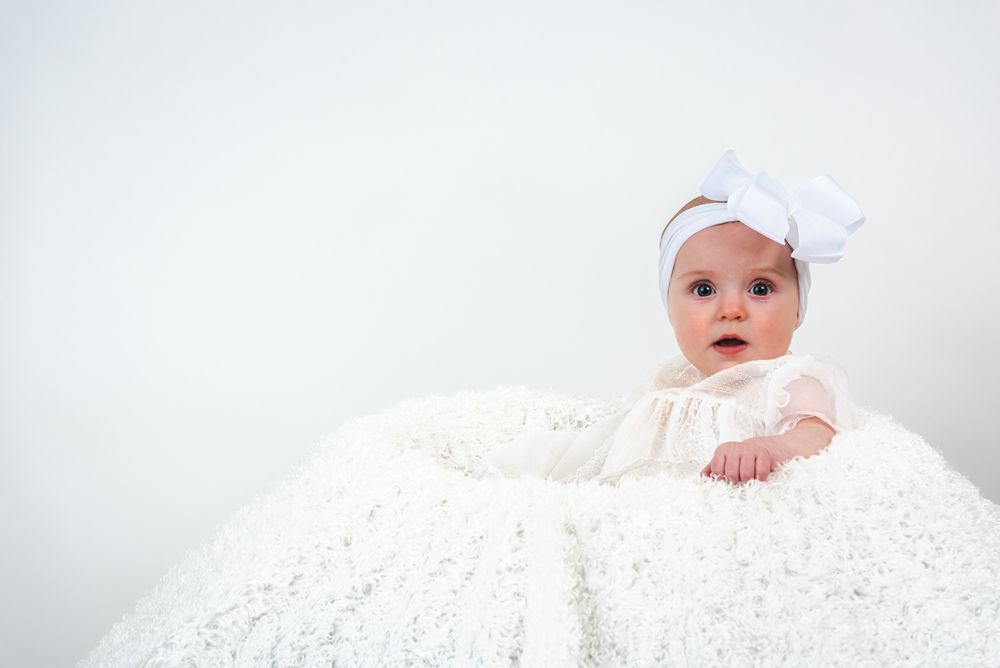baby portrait in white basket