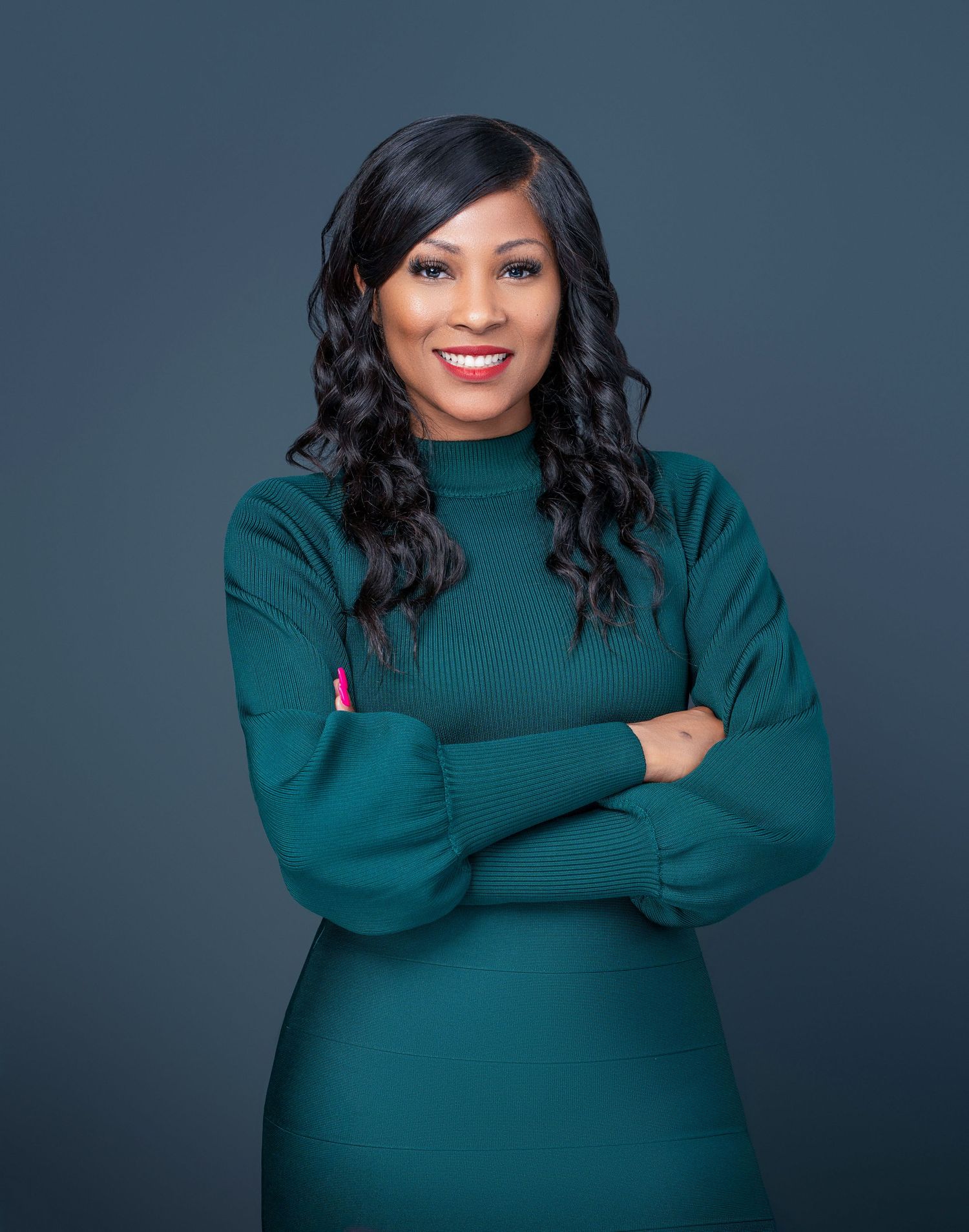 Fashion portraits featuring model in emerald turtleneck against dark studio background.