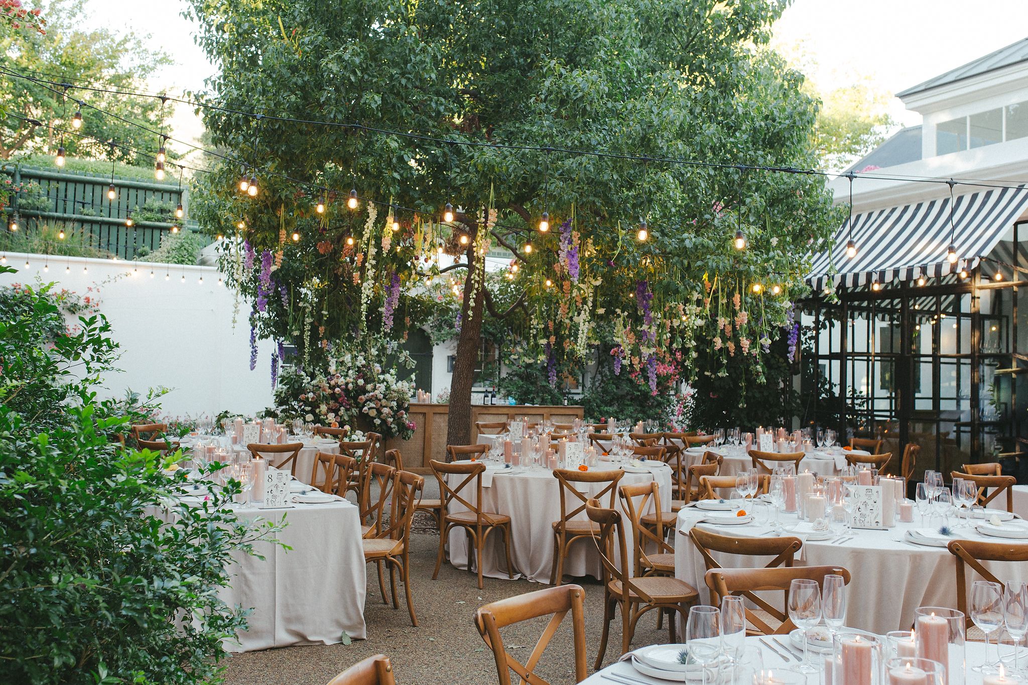 Al fresco wedding reception in the gardens at La Cotte Franschhoek