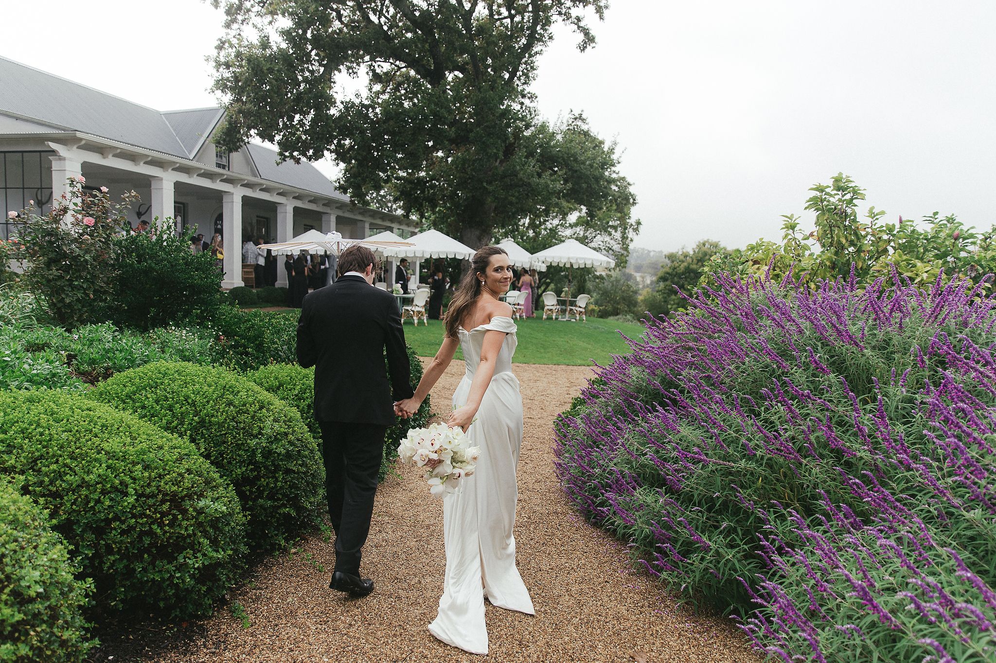 Bride and groom portraits at La Cotte in Franschhoek