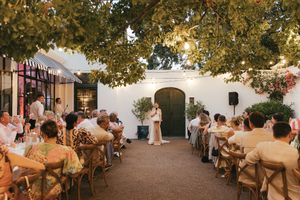 Bride giving a speech during the wedding reception at La Cotte, Franschhoek