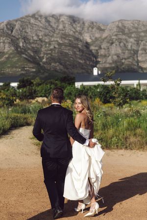 Golden hour wedding photos in the vineyards at La Cotte Franschhoek