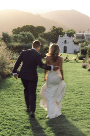 Bride and groom portraits at La Cotte in Franschhoek