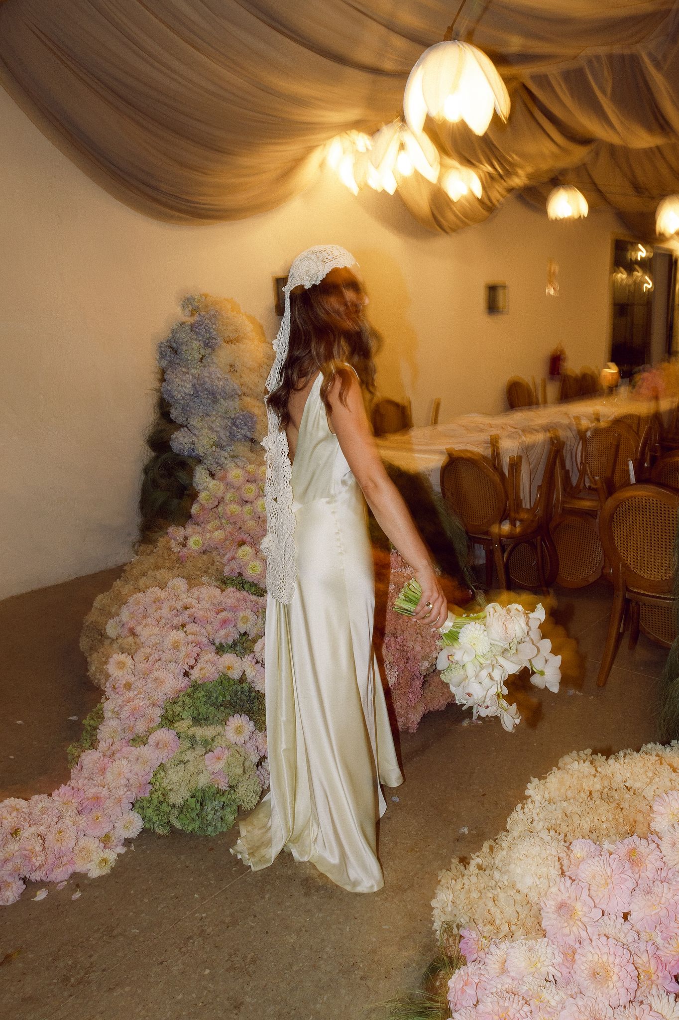 Bride indoor portraits at La Cotte in Franschhoek filled with flowers