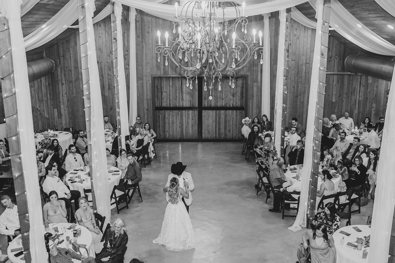 Bride and groom’s emotional last dance under twinkle lights at Whispering Oaks