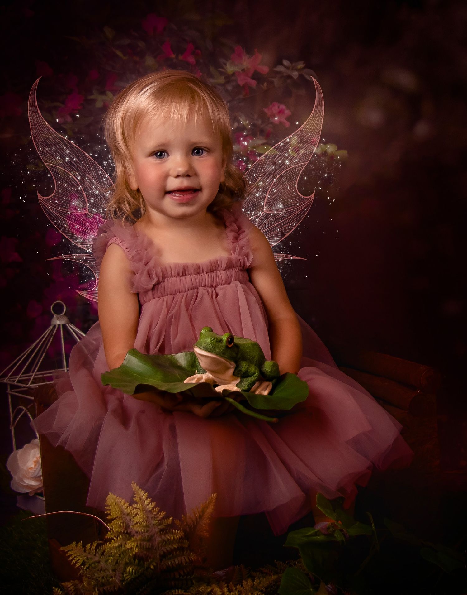 Enchanting fairy-themed photo series with delicate pink tulle dress and magical glowing elements against dark backdrop.