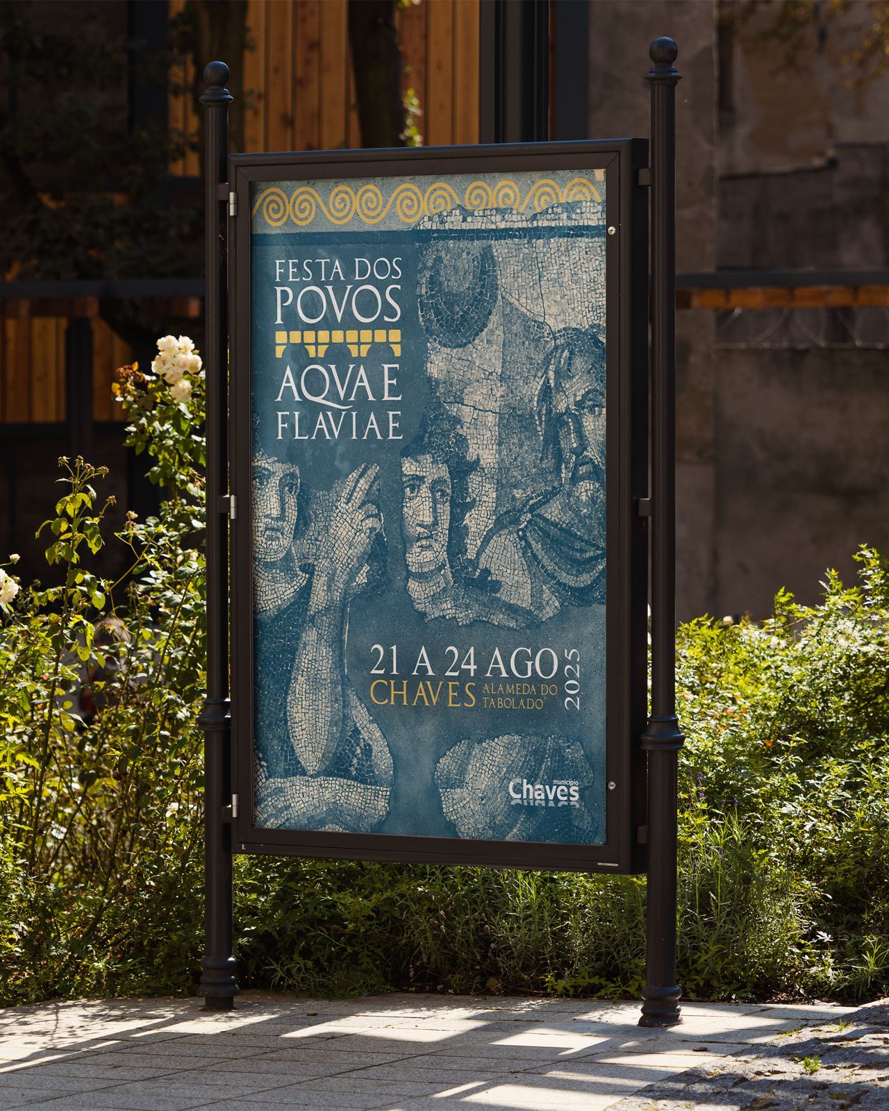 Outdoor signage displays with blue tinted historical or cultural imagery.