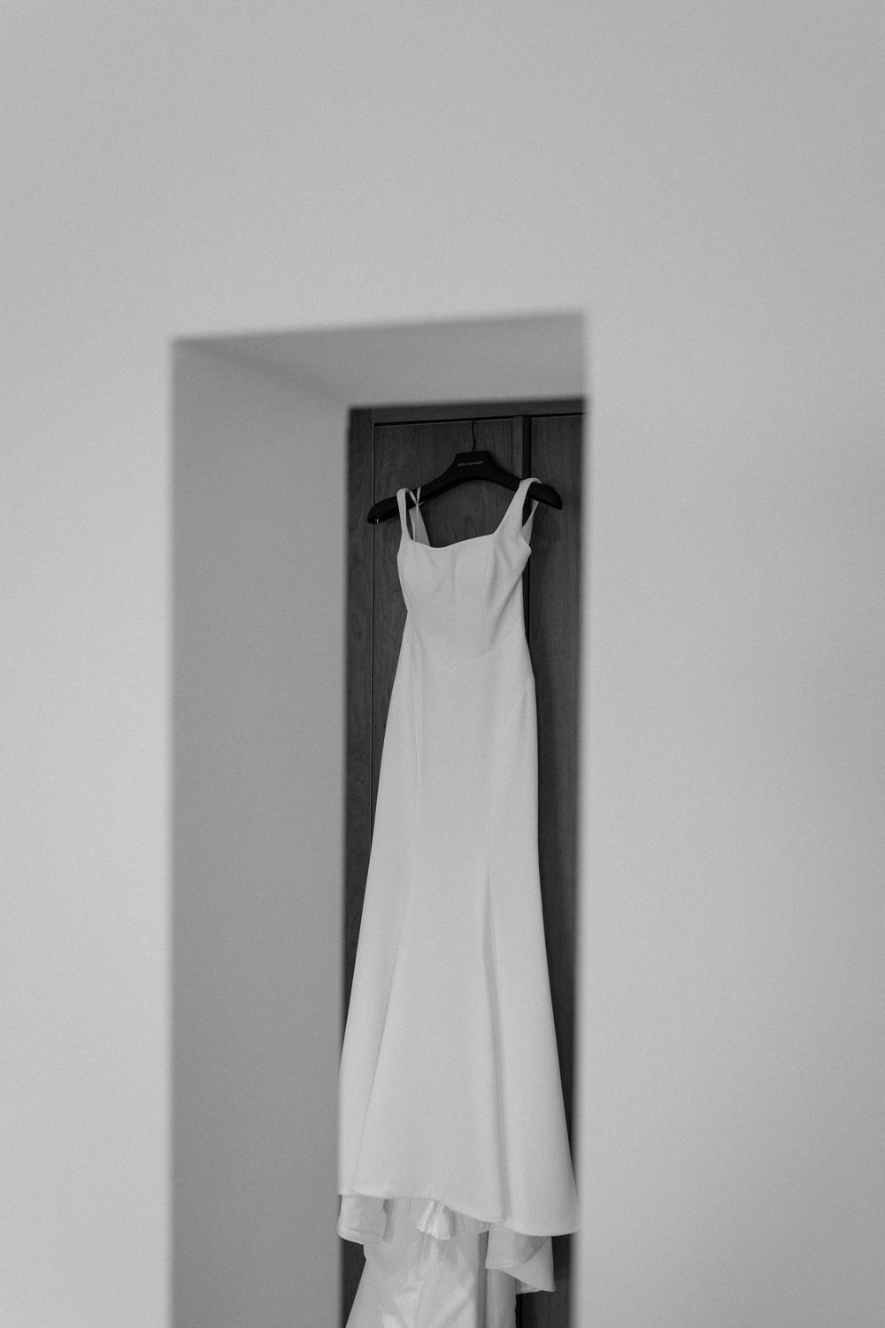 Wedding dress hangs up at Hope Street Hotel Liverpool.