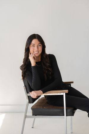 Candid lifestyle photos showing joyful expressions while lounging on modern furniture.