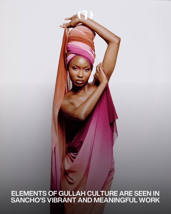 Fashion photograph featuring vibrant pink and coral draped fabric against a light background.