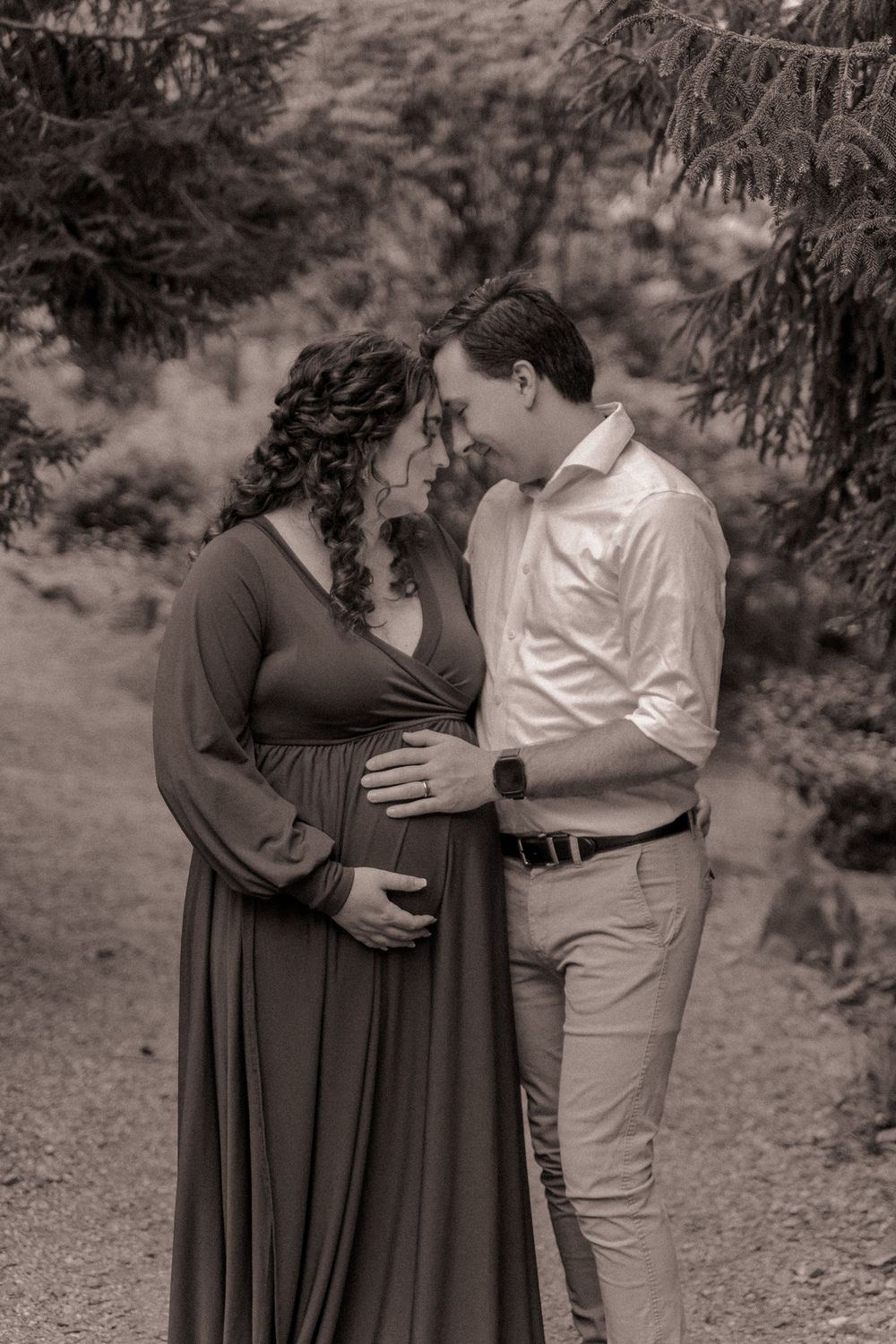 Future mother and father embracing each other during a maternity lifestyle session