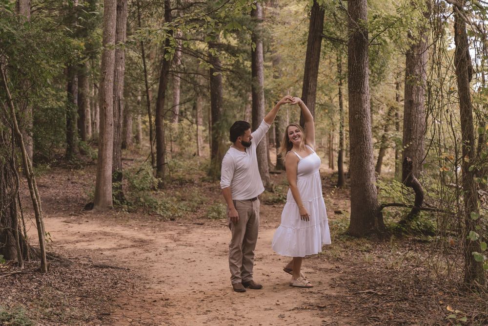 Couple dancing in the woods during a couples lifestyle session in Charlotte, North Carolina