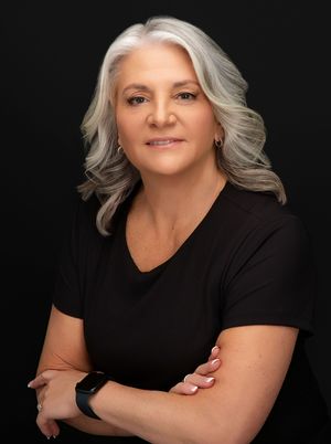 senior woman gray hair modeling portfolio studio natural portraits minimal retouch elegant mature model Sarasota